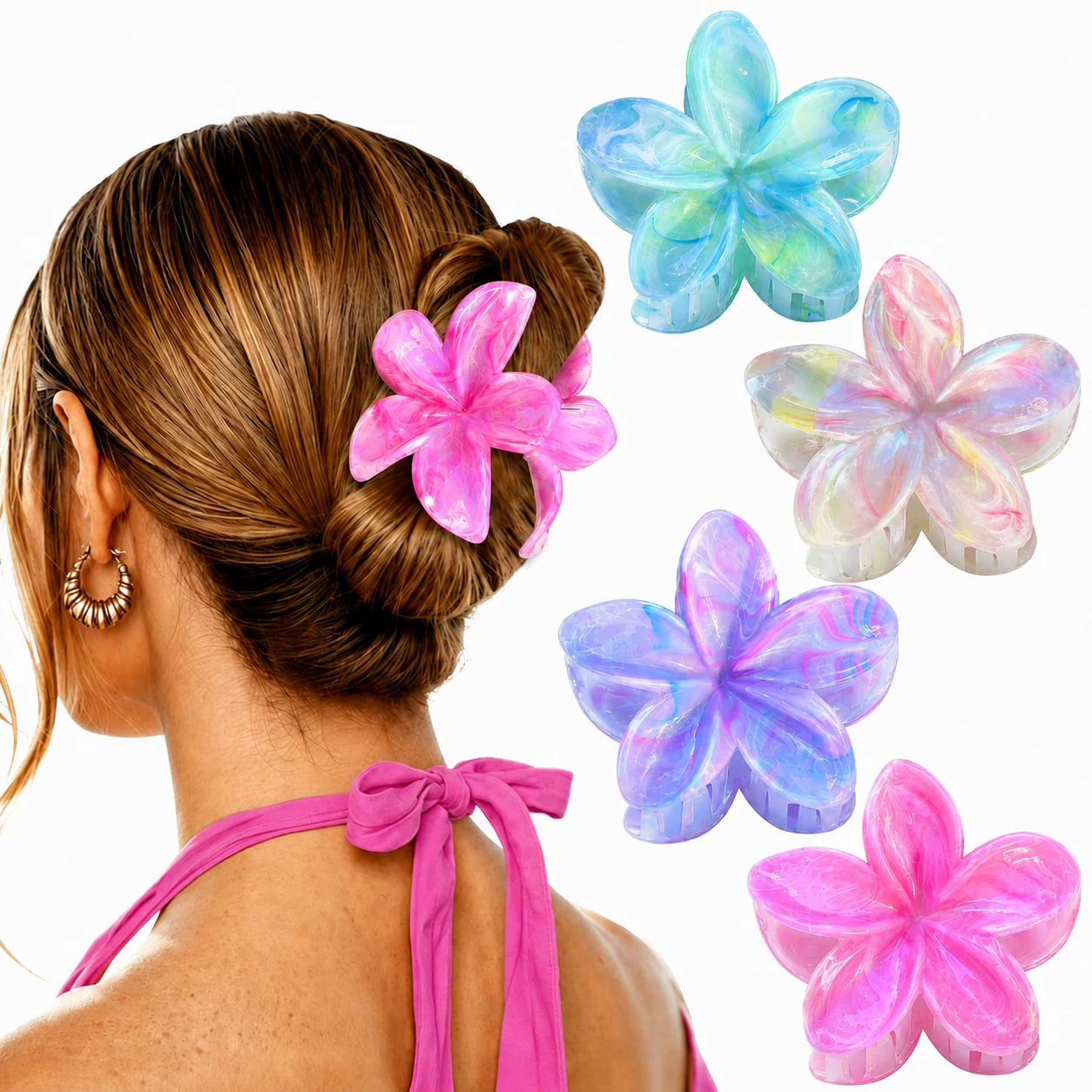 A vivid pink flower hair clip styled with a matching pink halter top